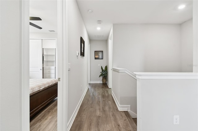 4653 Ancona Way, Wesley Chapel, FL 33543 - corridor featuring wood finished floors and recessed lighting