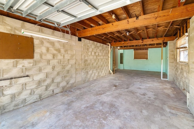 202 Peacock Ln Unit B, Holmes Beach, FL 34217 - garage featuring concrete block wall