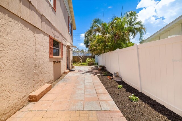 202 Peacock Ln Unit B, Holmes Beach, FL 34217 - fenced backyard with a patio