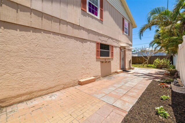202 Peacock Ln Unit B, Holmes Beach, FL 34217 - fenced backyard with a patio