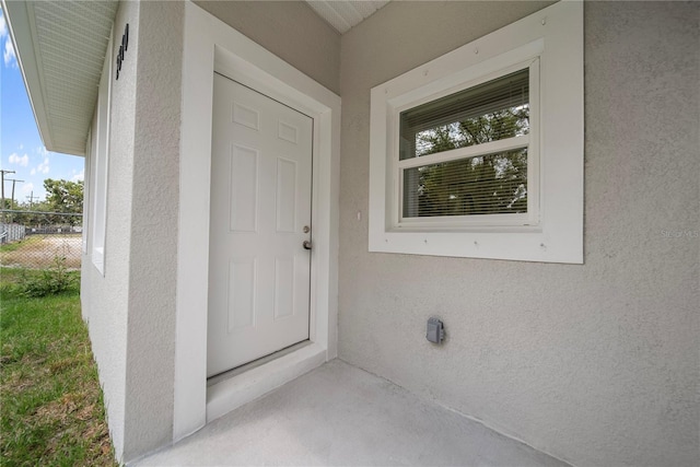 2810 N 75th St, Tampa, FL 33619 - entrance to property with stucco siding