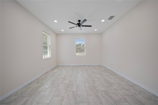 2810 N 75th St, Tampa, FL 33619 - unfurnished room with a ceiling fan and recessed lighting