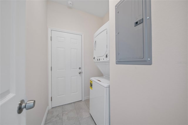 2810 N 75th St, Tampa, FL 33619 - washroom with stacked washer / drying machine, electric panel, and light tile patterned floors