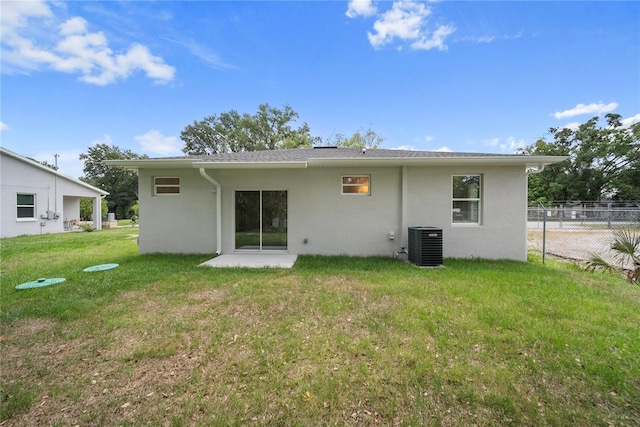 2810 N 75th St, Tampa, FL 33619 - back of house with stucco siding