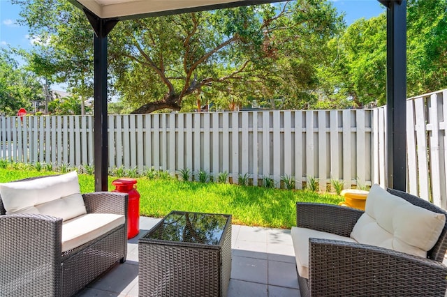 1011 S Moody Ave Unit 11, Tampa, FL 33629 - fenced backyard featuring an outdoor hangout area and a patio