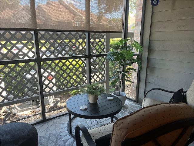 2500 Winding Creek Blvd Unit B105, Clearwater, FL 33761 - sunroom featuring plenty of natural light