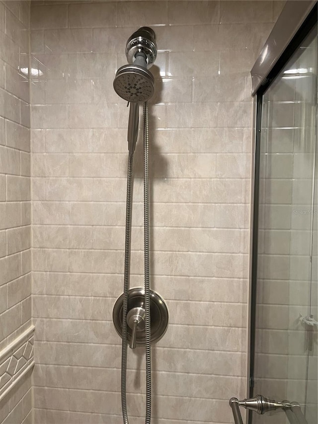 2500 Winding Creek Blvd Unit B105, Clearwater, FL 33761 - bathroom view of a tile shower