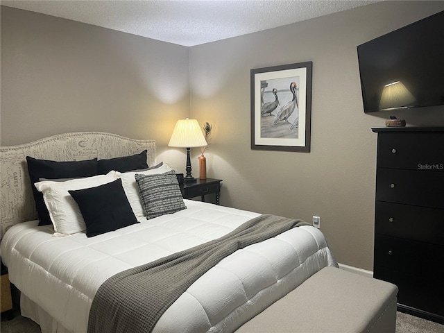 2500 Winding Creek Blvd Unit B105, Clearwater, FL 33761 - bedroom with carpet floors and baseboards