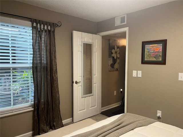 2500 Winding Creek Blvd Unit B105, Clearwater, FL 33761 - bedroom with baseboards