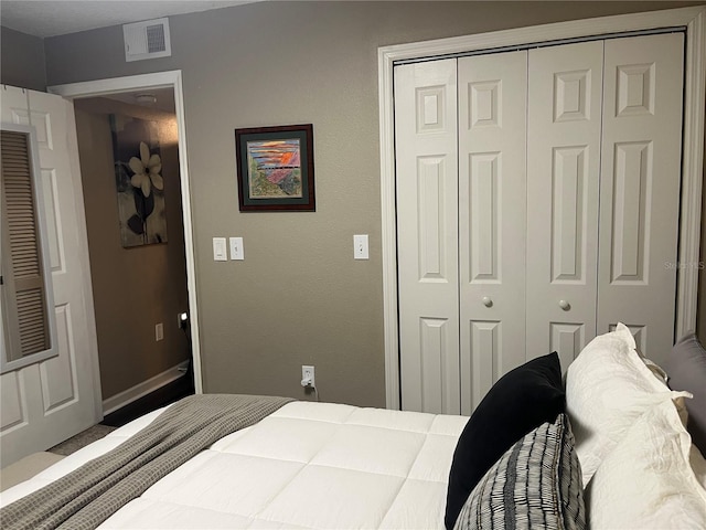2500 Winding Creek Blvd Unit B105, Clearwater, FL 33761 - bedroom featuring a closet