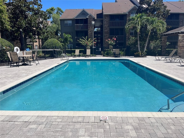 2500 Winding Creek Blvd Unit B105, Clearwater, FL 33761 - community pool featuring a patio