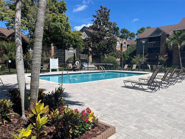 2500 Winding Creek Blvd Unit B105, Clearwater, FL 33761 - community pool with a patio area