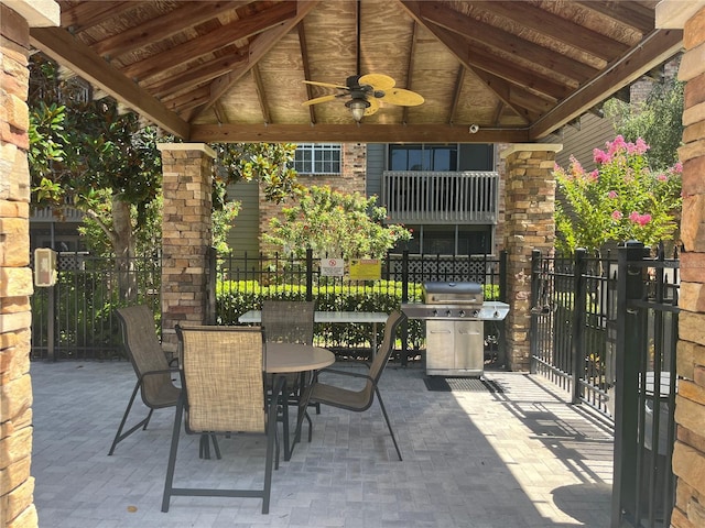 2500 Winding Creek Blvd Unit B105, Clearwater, FL 33761 - view of patio / terrace with a gazebo, grilling area, a ceiling fan, and outdoor dining space