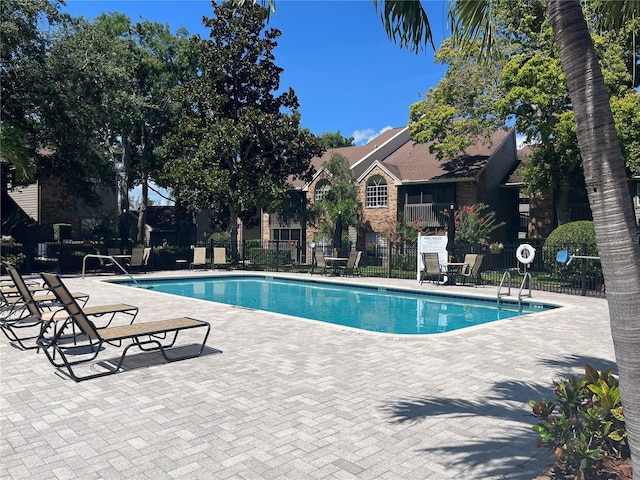 2500 Winding Creek Blvd Unit B105, Clearwater, FL 33761 - community pool featuring a patio
