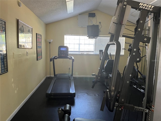 2500 Winding Creek Blvd Unit B105, Clearwater, FL 33761 - exercise area featuring lofted ceiling and a textured ceiling