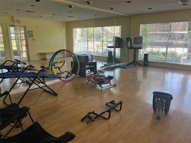 2500 Winding Creek Blvd Unit B105, Clearwater, FL 33761 - exercise room featuring wood finished floors