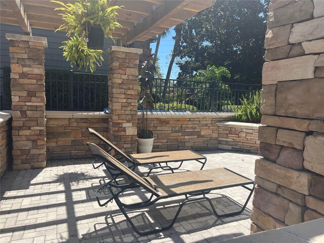 2500 Winding Creek Blvd Unit B105, Clearwater, FL 33761 - view of patio / terrace