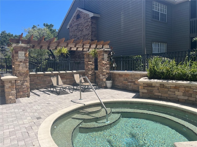 2500 Winding Creek Blvd Unit B105, Clearwater, FL 33761 - view of swimming pool with a pergola and a patio area