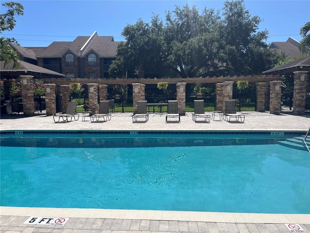 2500 Winding Creek Blvd Unit B105, Clearwater, FL 33761 - community pool featuring a patio