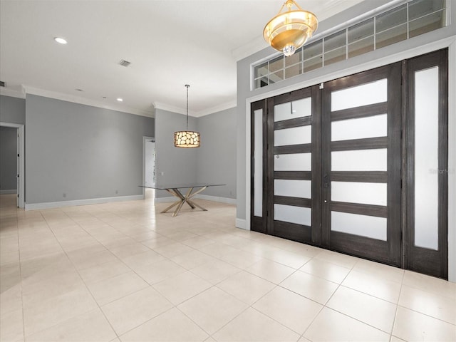 713 Argyle Pl, Temple Terrace, FL 33617 - foyer entrance featuring crown molding, recessed lighting, and light tile patterned floors