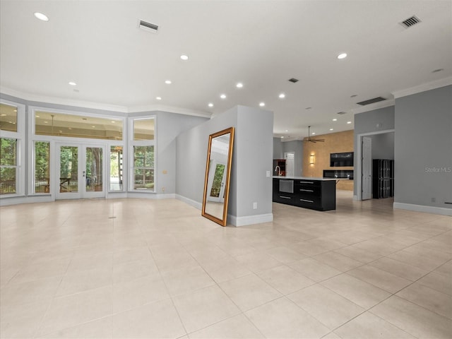 713 Argyle Pl, Temple Terrace, FL 33617 - unfurnished living room with ornamental molding, light tile patterned floors, recessed lighting, and ceiling fan