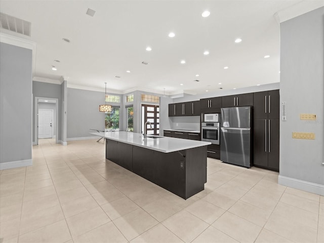 713 Argyle Pl, Temple Terrace, FL 33617 - kitchen with appliances with stainless steel finishes, light countertops, crown molding, light tile patterned floors, and recessed lighting