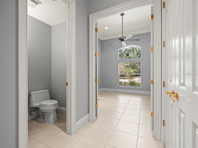 713 Argyle Pl, Temple Terrace, FL 33617 - bathroom featuring tile patterned floors, ceiling fan, and crown molding