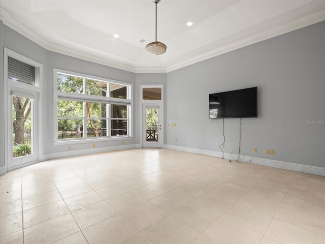713 Argyle Pl, Temple Terrace, FL 33617 - empty room with light tile patterned floors, a raised ceiling, and crown molding