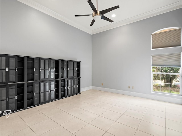 713 Argyle Pl, Temple Terrace, FL 33617 - tiled empty room with ceiling fan, crown molding, a towering ceiling, and recessed lighting