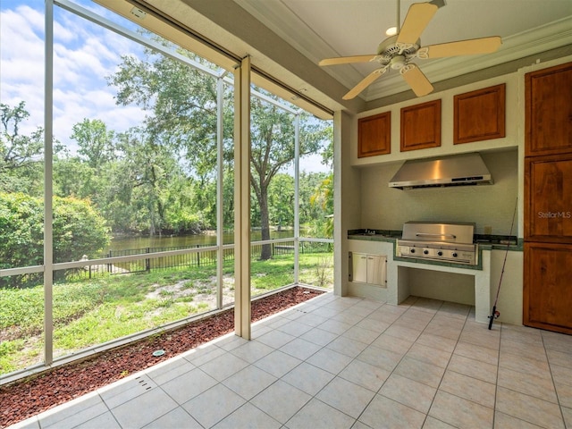 713 Argyle Pl, Temple Terrace, FL 33617 - unfurnished sunroom featuring a water view, a ceiling fan, exterior kitchen, and healthy amount of natural light