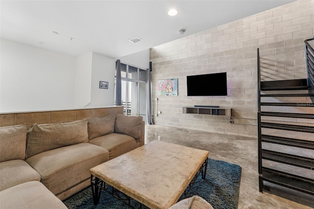 5008 S Macdill Ave Unit 16, Tampa, FL 33611 - living room featuring a fireplace, stairway, and recessed lighting