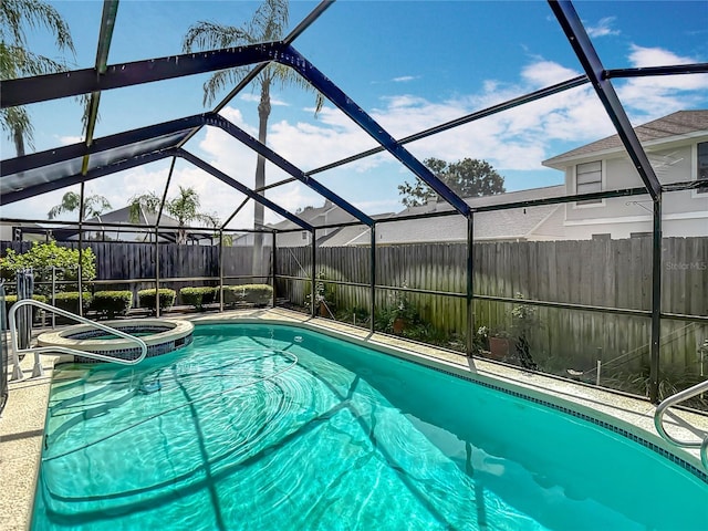 1906 White Cedar Way, Brandon, FL 33511 - view of pool with a fenced backyard, a pool with connected hot tub, and a lanai