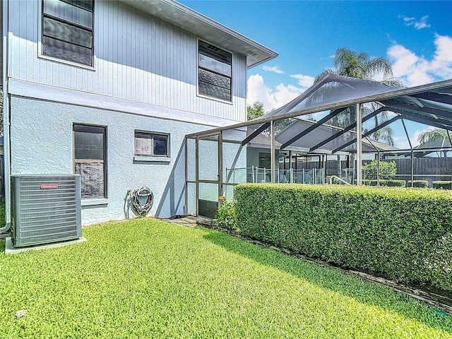 1906 White Cedar Way, Brandon, FL 33511 - back of property with a yard and a lanai