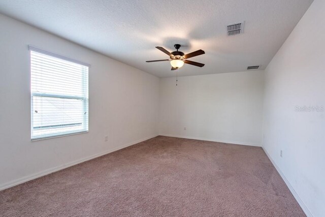 11035 Sage Canyon Dr, Riverview, FL 33578 - carpeted spare room featuring a ceiling fan and baseboards