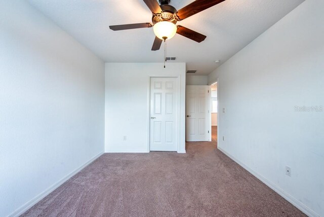 11035 Sage Canyon Dr, Riverview, FL 33578 - unfurnished bedroom featuring carpet and ceiling fan