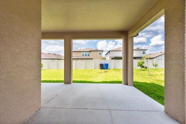 11035 Sage Canyon Dr, Riverview, FL 33578 - fenced backyard featuring a patio and a residential view
