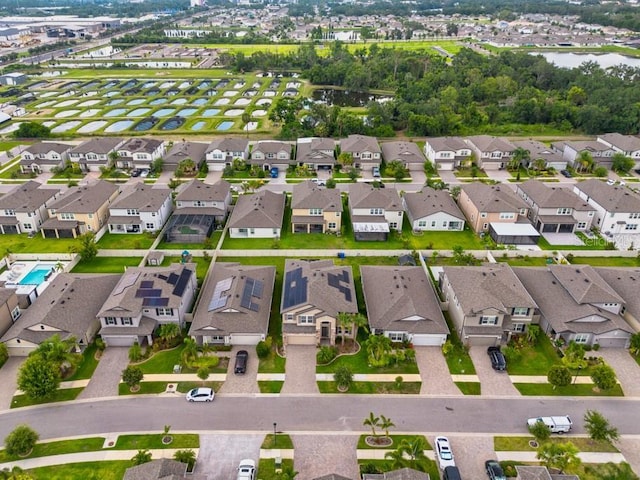 11035 Sage Canyon Dr, Riverview, FL 33578 - aerial view of property and surrounding area featuring nearby suburban area and a nearby body of water