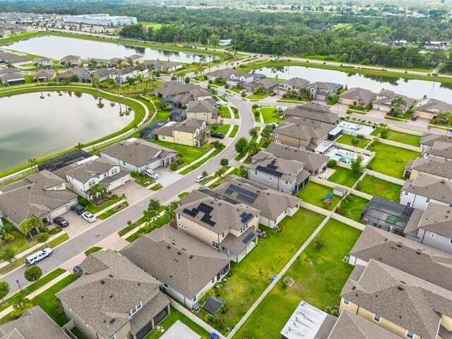 11035 Sage Canyon Dr, Riverview, FL 33578 - aerial view of residential area with a large body of water