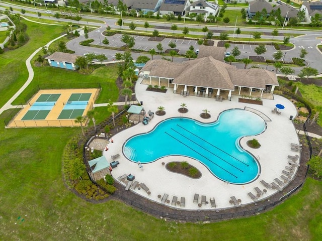 11035 Sage Canyon Dr, Riverview, FL 33578 - community pool featuring a patio and a residential view