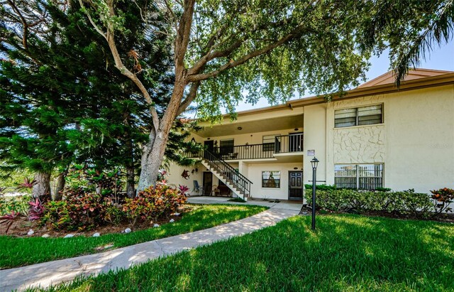 1729 Seascape Cir Unit 102, Tarpon Springs, FL 34689 - view of property with stairway