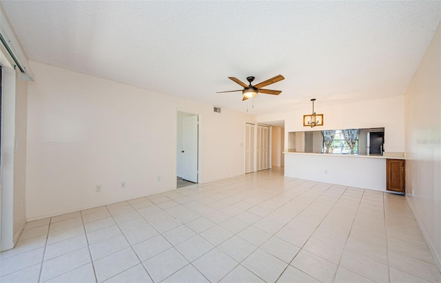 1729 Seascape Cir Unit 102, Tarpon Springs, FL 34689 - unfurnished living room featuring ceiling fan
