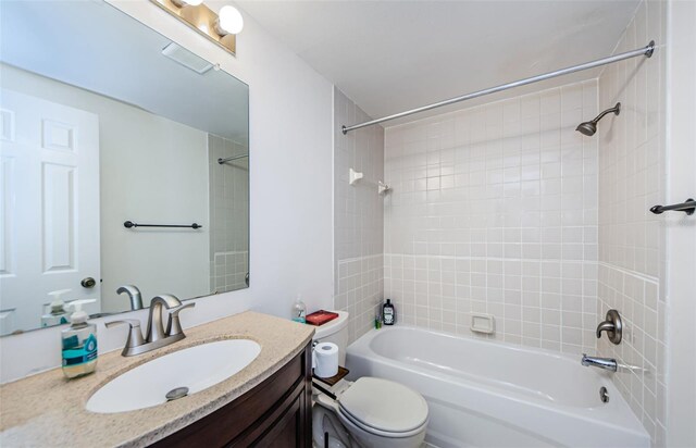 1729 Seascape Cir Unit 102, Tarpon Springs, FL 34689 - bathroom featuring bathing tub / shower combination and vanity