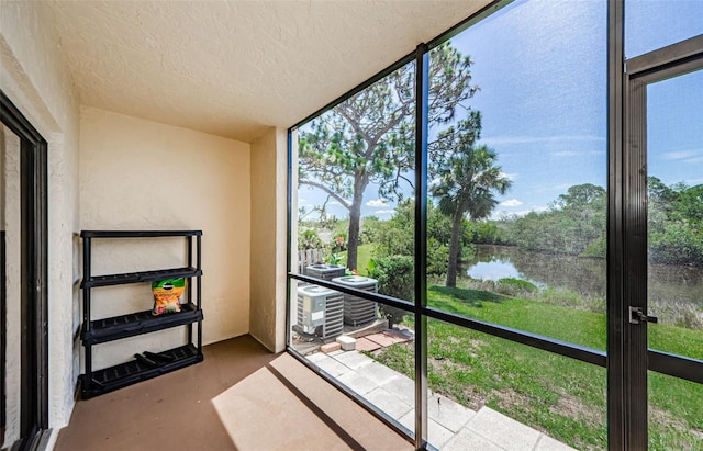 1729 Seascape Cir Unit 102, Tarpon Springs, FL 34689 - sunroom with a water view