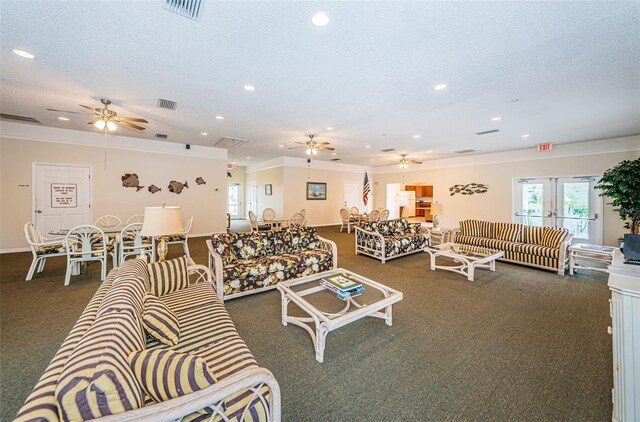 1729 Seascape Cir Unit 102, Tarpon Springs, FL 34689 - living area with ceiling fan, dark carpet, recessed lighting, crown molding, and a textured ceiling
