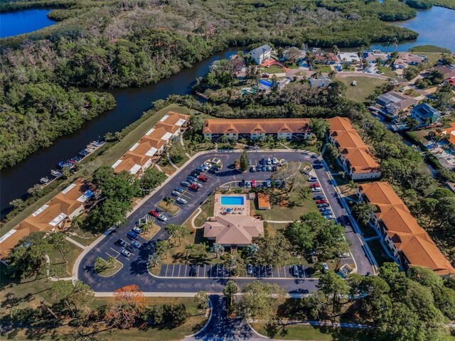1729 Seascape Cir Unit 102, Tarpon Springs, FL 34689 - aerial view of property's location with a large body of water and nearby suburban area