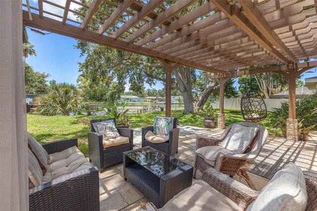 10730 52nd Ave N, Saint Petersburg, FL 33708 - fenced backyard featuring an outdoor hangout area and a pergola