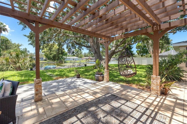10730 52nd Ave N, Saint Petersburg, FL 33708 - view of patio / terrace featuring a pergola and a water view