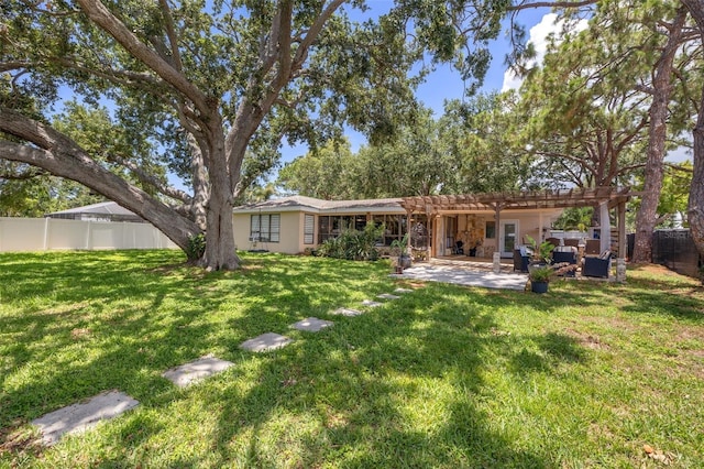 10730 52nd Ave N, Saint Petersburg, FL 33708 - rear view of property with a fenced backyard, a pergola, a patio, and outdoor lounge area