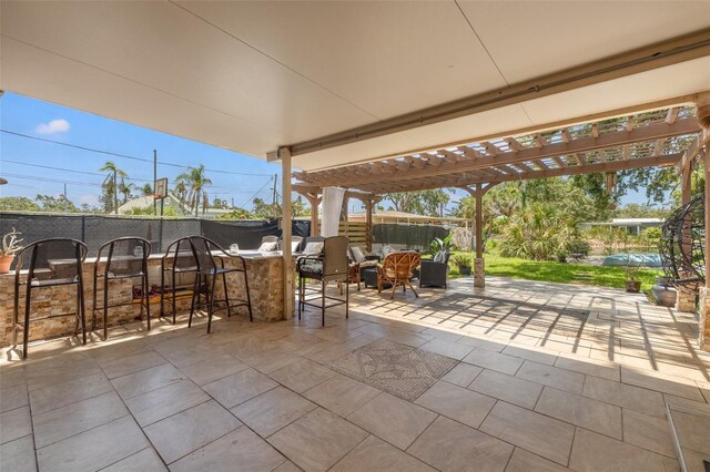 10730 52nd Ave N, Saint Petersburg, FL 33708 - view of patio / terrace featuring a pergola