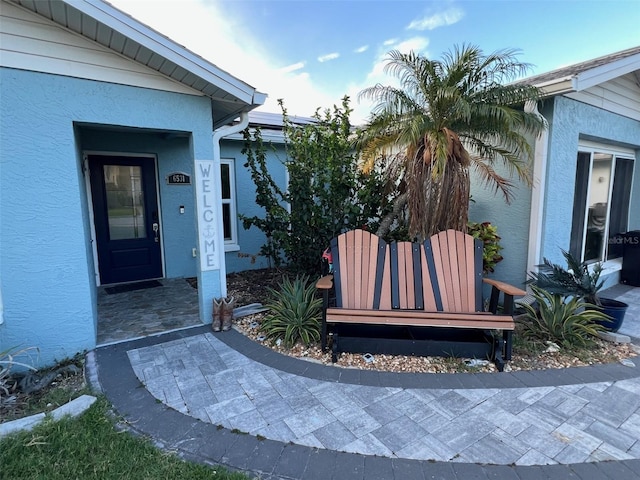 6531 Seaview Blvd, Hudson, FL 34667 - view of exterior entry with stucco siding